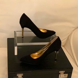 Black faux suede gold heel pump
